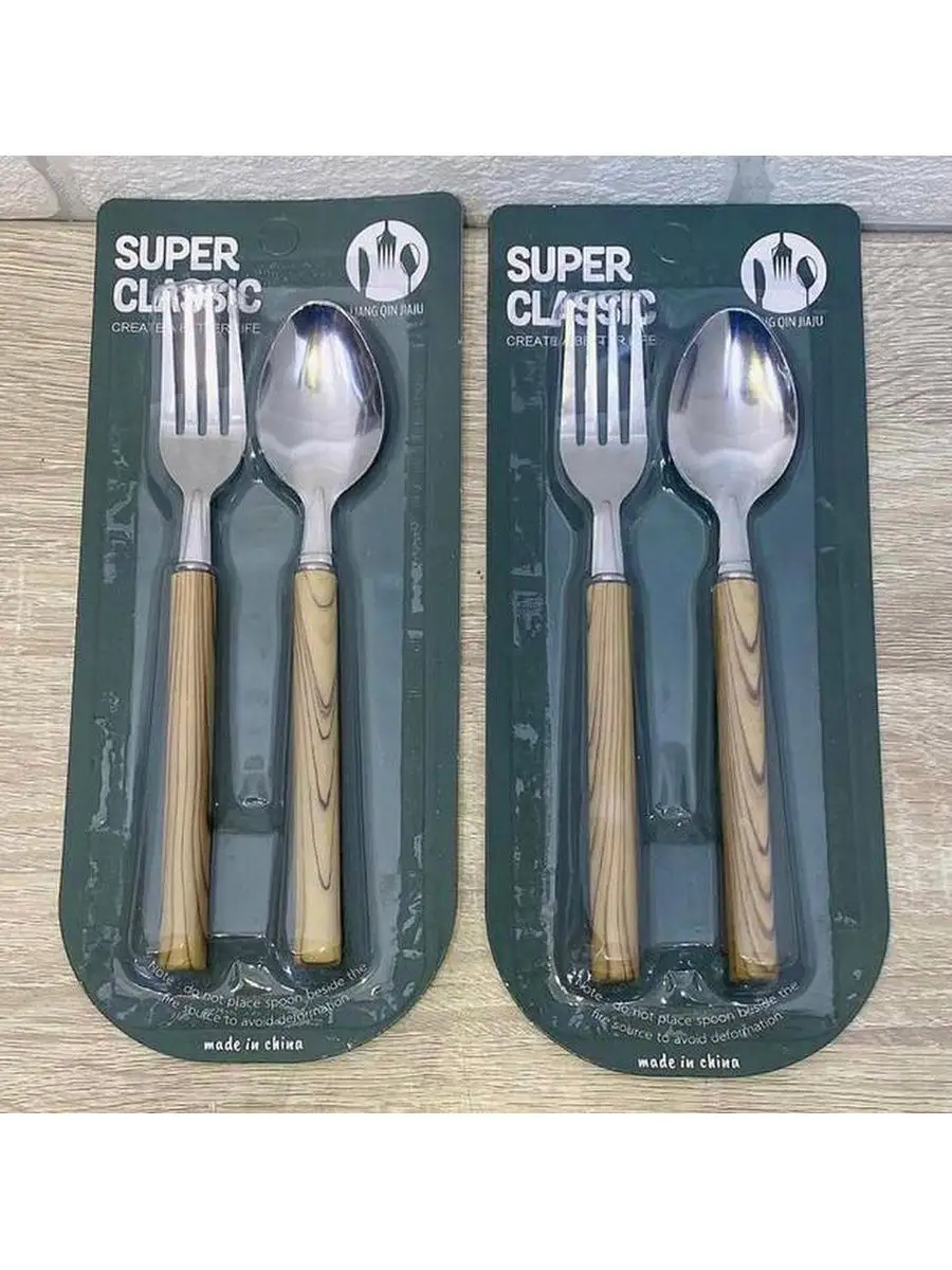 طقم ملعقة و شوكة اكل ستيل راقي يد شكل خشبي  AGF-1527