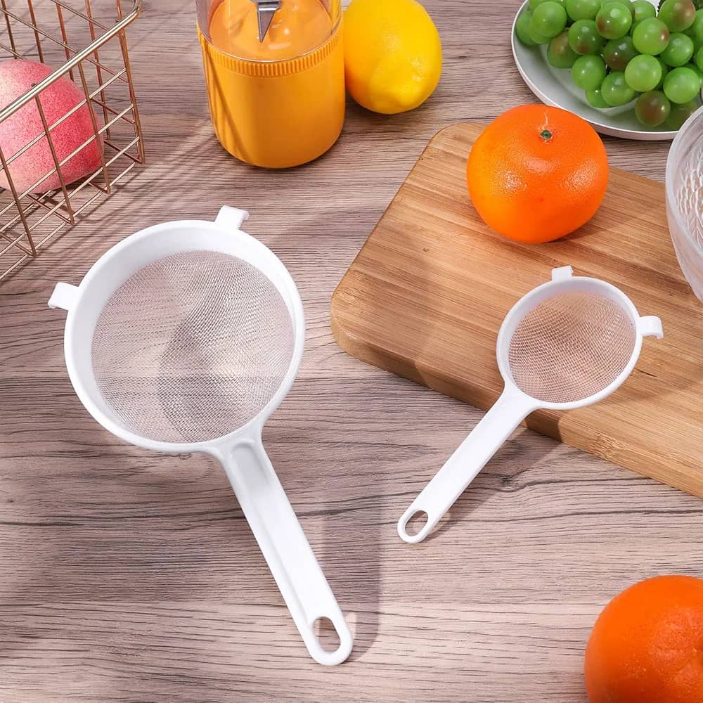 مشن عصير بيد بلاستيك ابيض